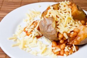 4153713-hot-and-crispy-baked-potato-stuffed-with-baked-beans-and-cheddar-cheese