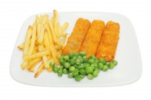 9319633-a-childs-portion-of-fish-fingers-chips-and-peas-isolated-against-white